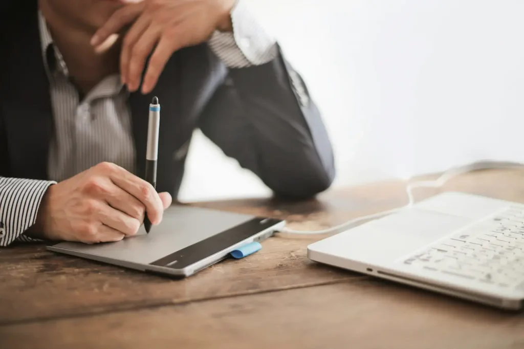 Graphic Designer using a tablet